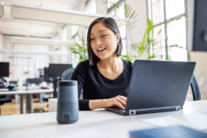 Woman using smart home technology