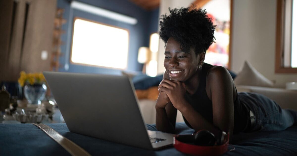 Woman using a VPN for streaming on a computer