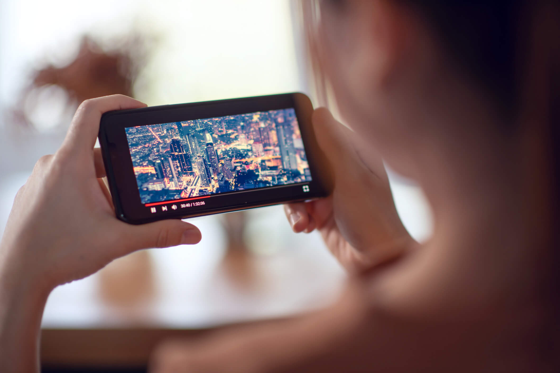 Woman Streaming on Her smartPhone