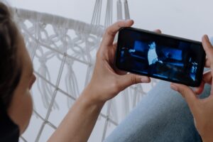 Woman watching video on her smartphone