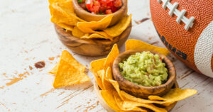 NFL Super Bowl 2022 stock photograph featuring nachos and a football