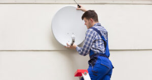 A cable dish receiver is being installed