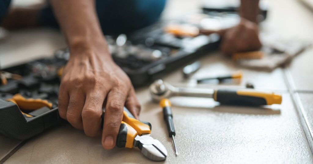 Tools lying on tile floor