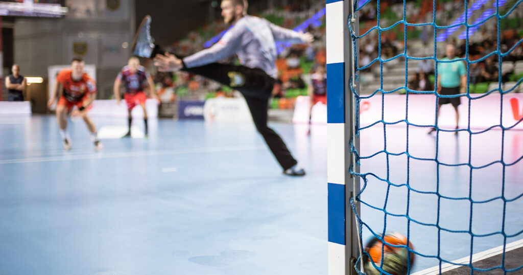 Photograph of people playing Handball