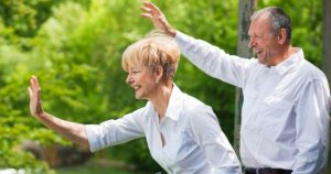 Stock photograph of two seniors saying goodbye