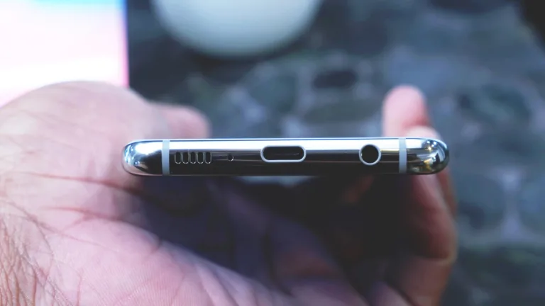 Samsung phone held sideways to highlight USB-C port used for charging