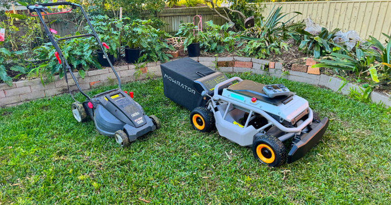 Photo of the Mowrator S1 next to Ozito electric lawnmower