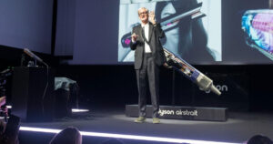 sir james dyson on stage announcing dyson airtstrait