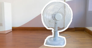 pedestal fan on the floor