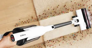 Tineco A30S stick vacuum from above, vacuuming an obscene amount of fruity pebbles